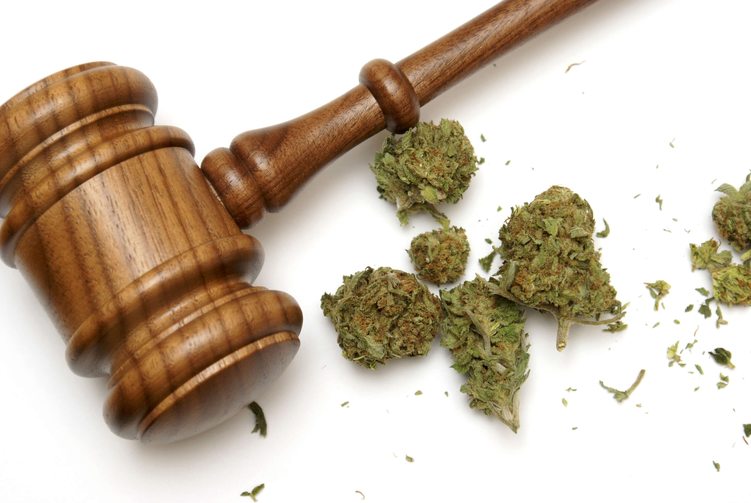 Court gavel next to marijuana.